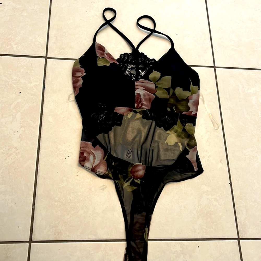 Black and flower body suit